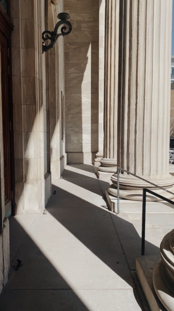 columns outside a courthouse indicating legal marketing services provided by page seven marketing