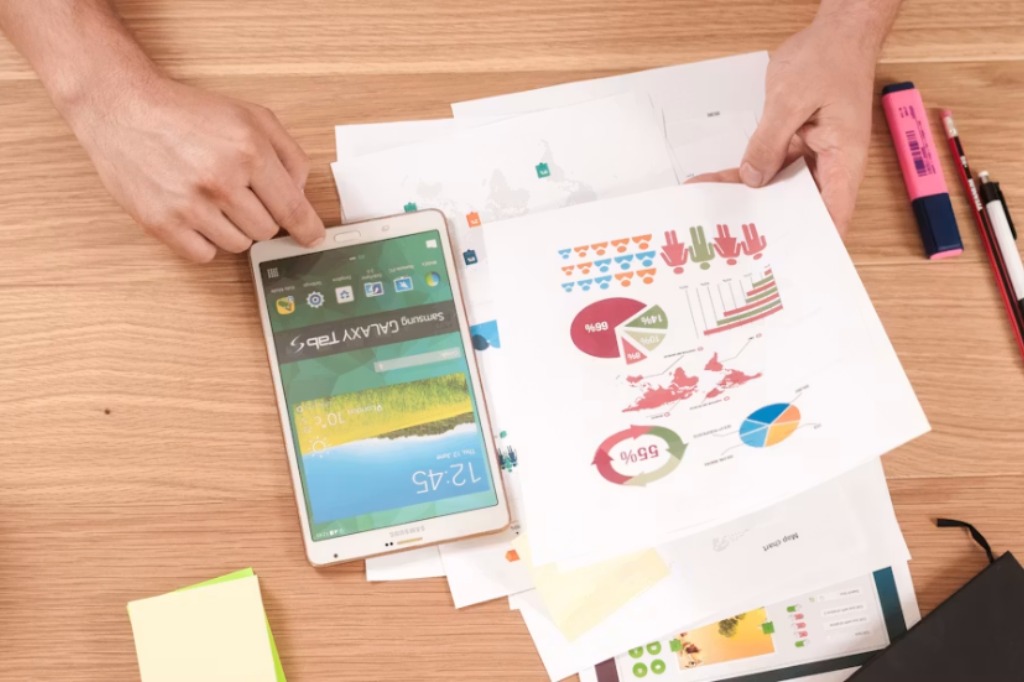 results and charts on a table that are supportive of page seven marketing agency and getting SEO results with a qualified audit.